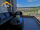 Balcony with city view and wicker furniture