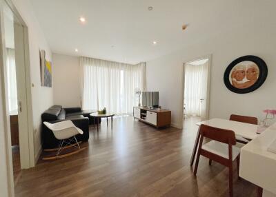 Modern living room with wood flooring and natural light