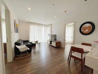 Modern living room with wood flooring and natural light