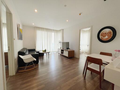 Modern living room with wood flooring and natural light