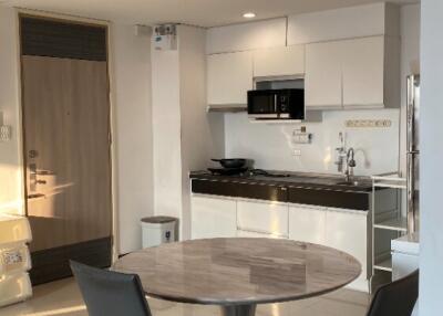 Modern kitchen with dining table