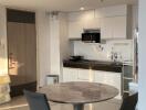 Modern kitchen with dining table