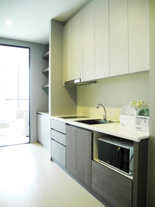 Modern kitchen with built-in cabinetry and appliances