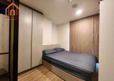 Modern bedroom with a double bed and built-in wardrobe