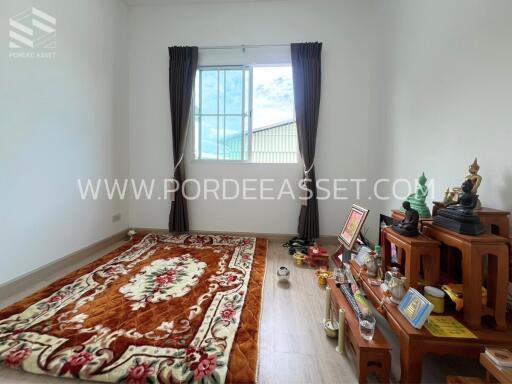 Simple room with window and traditional decorative items