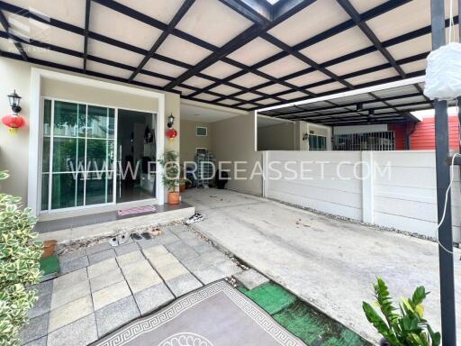 Front garage area with tiled entrance and covered parking