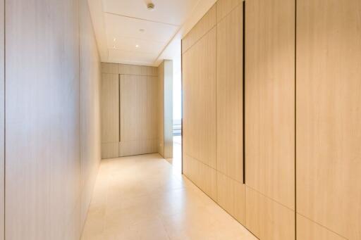 Bright modern hallway with wooden paneling