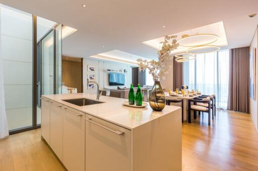 Open-plan kitchen with modern dining area and living space