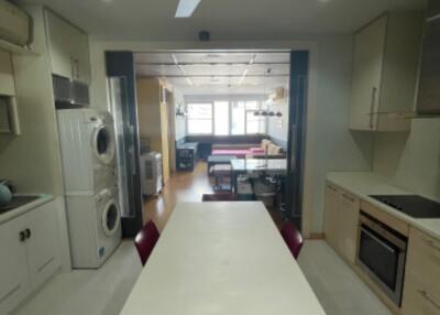 Modern kitchen with adjacent living space