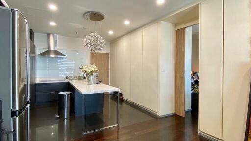 Modern kitchen with island and stainless steel appliances