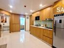 Modern kitchen with wooden cabinetry and stainless steel appliances