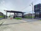 Main entrance and security gate of a residential complex