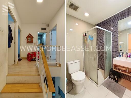 Staircase leading to upper floor and modern bathroom with shower