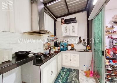 Modern kitchen with appliances and open shelves