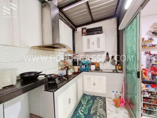 Modern kitchen with appliances and open shelves