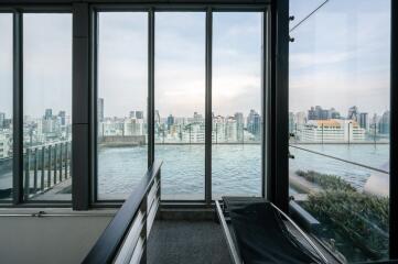 City view from a modern building with large windows