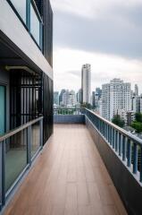 Spacious balcony with a city view