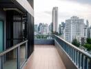 Spacious balcony with a city view