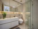 Modern bathroom with large mirror and glass shower