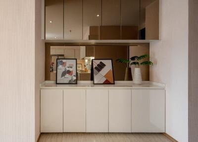 Modern Living Area with Cabinets and Artwork