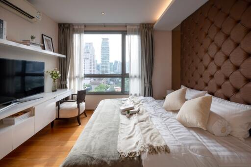 Modern bedroom with city view