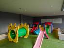 indoor playground with slides and tunnel