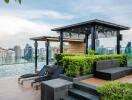 Modern rooftop terrace with pool, city view and lounge chairs