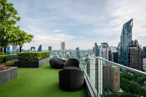 Balcony with city view and modern seating area