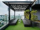 Rooftop terrace with seating area and city view