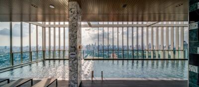 Infinity pool with a panoramic city view