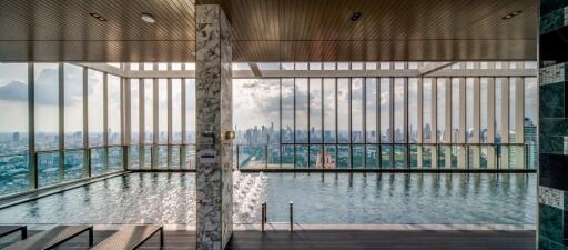 Infinity pool with a panoramic city view