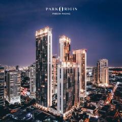 View of Park Origin Phrom Phong buildings at night