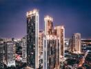 View of Park Origin Phrom Phong buildings at night