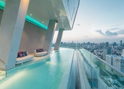 Infinity pool with city skyline view