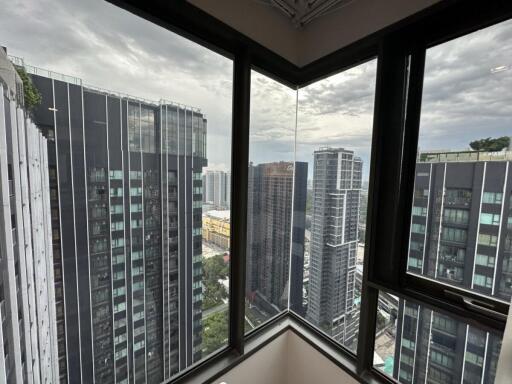 View of modern high-rise buildings from a corner window