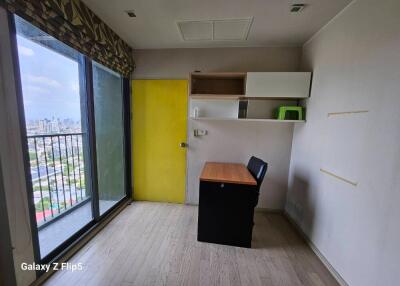 Bedroom with desk and view