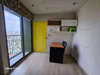 Bedroom with desk and view