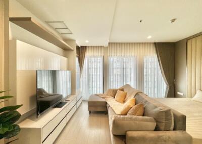 Living room with modern decor and natural light