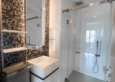 Modern bathroom with a walk-in shower and stylish vanity