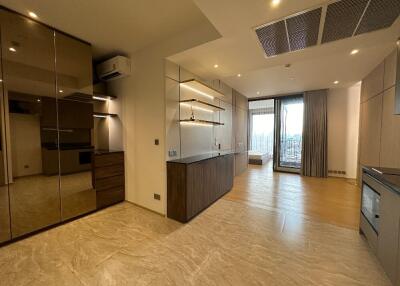 spacious modern living area with kitchen