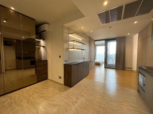 spacious modern living area with kitchen