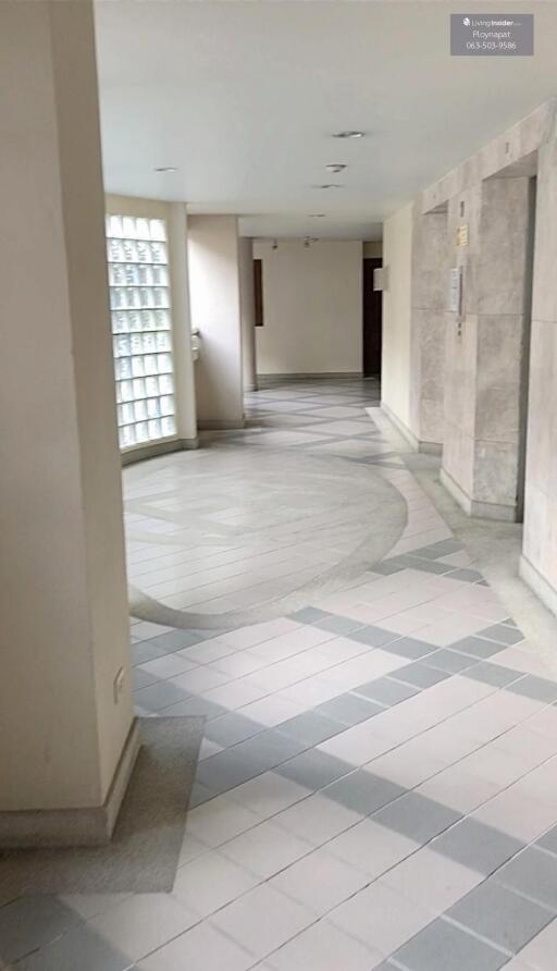 Building hallway with tiled floor