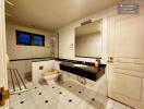 Bathroom with tiled walls and floor, a toilet, and a sink