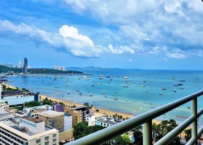 Balcony with a view of the beach and city skyline