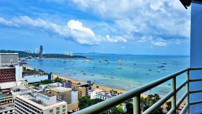 Balcony with a view of the beach and city skyline