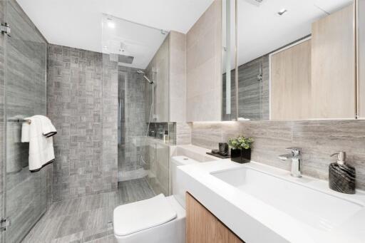 Modern bathroom with glass shower and vanity