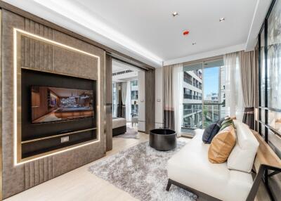 Modern living room with large window and sectional sofa