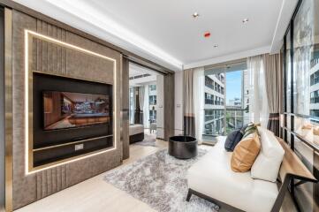 Modern living room with large window and sectional sofa