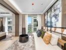 Modern living room with adjacent bedroom and balcony