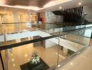 Modern and spacious building lobby with glass railings